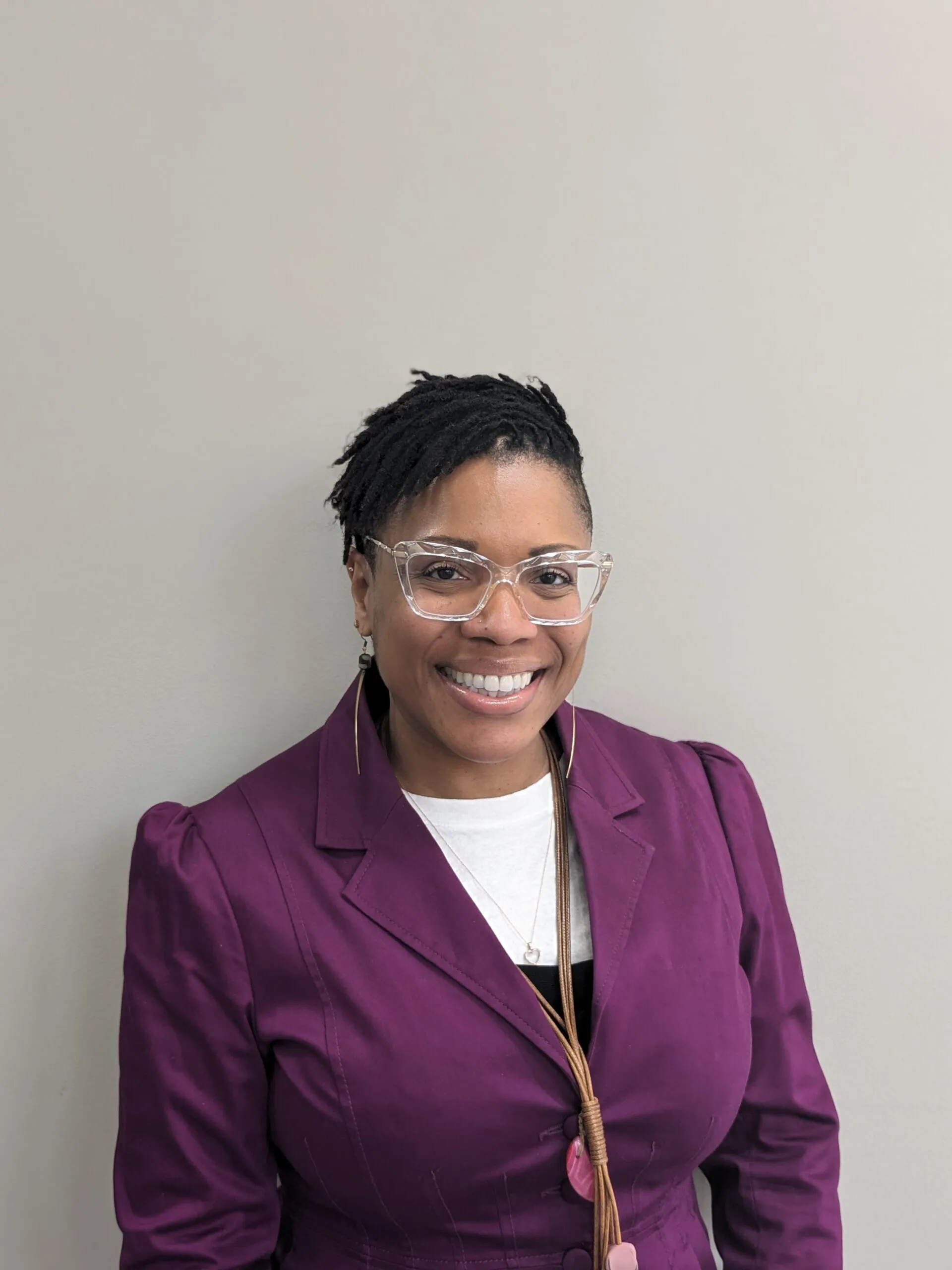 Dr. Brynez Roane